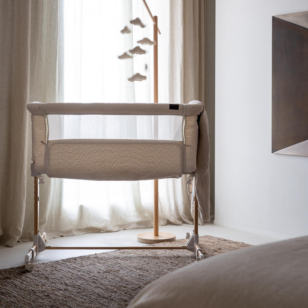 Quax Side by Side Co-Sleeper Crib in Natural Bouclé Cream with bedside sleeping desing in modern home