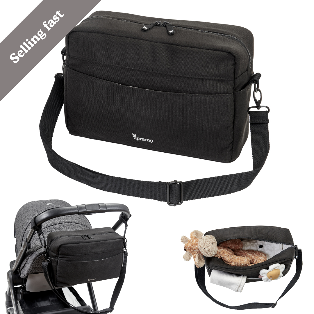 stylish looking black stroller pram puschair organiser bag with shoulder strap made from 100% recycled fabric. Bag has a storng looking shoulder strap so it can be either be worn by parent or attached to pram or stroller