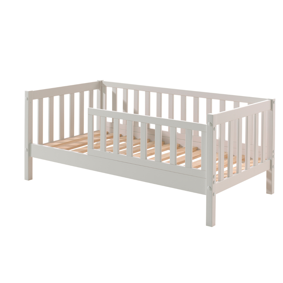 sturdy looking well built White VIPACK JAXX peuterbed toddler bed made from FSC certified wood with guard rail on plain white background with no mattress so wooden bed slats are visible