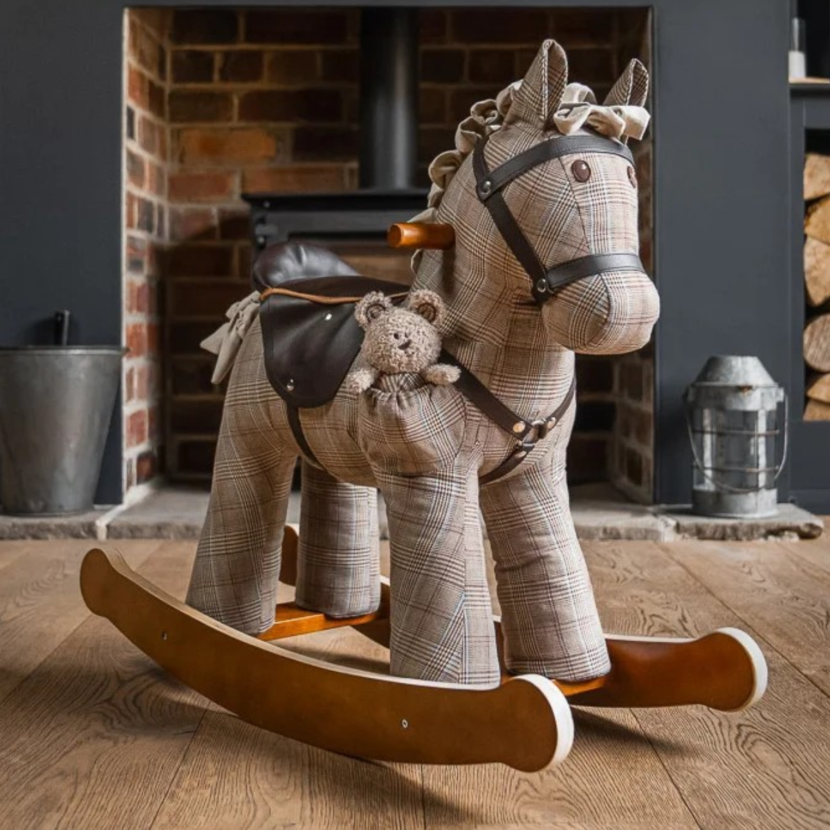little bird told me jasper and blake rocking horse on wooden floor