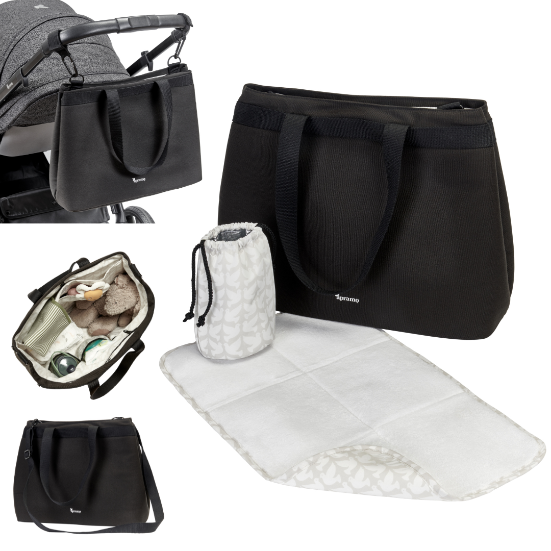 Black baby changing pram stroller bag with ample storage made from 100% recycled polyester with insulated bottle holder and baby changing mat made from super soft bamboo and sustainable plant based sorana fibre. Bag is shown attached to stroller pram using stroller hooks