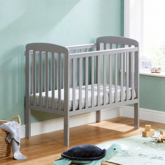 Babymore grey space saver baby cot  100x50cm in small nursery bedroom