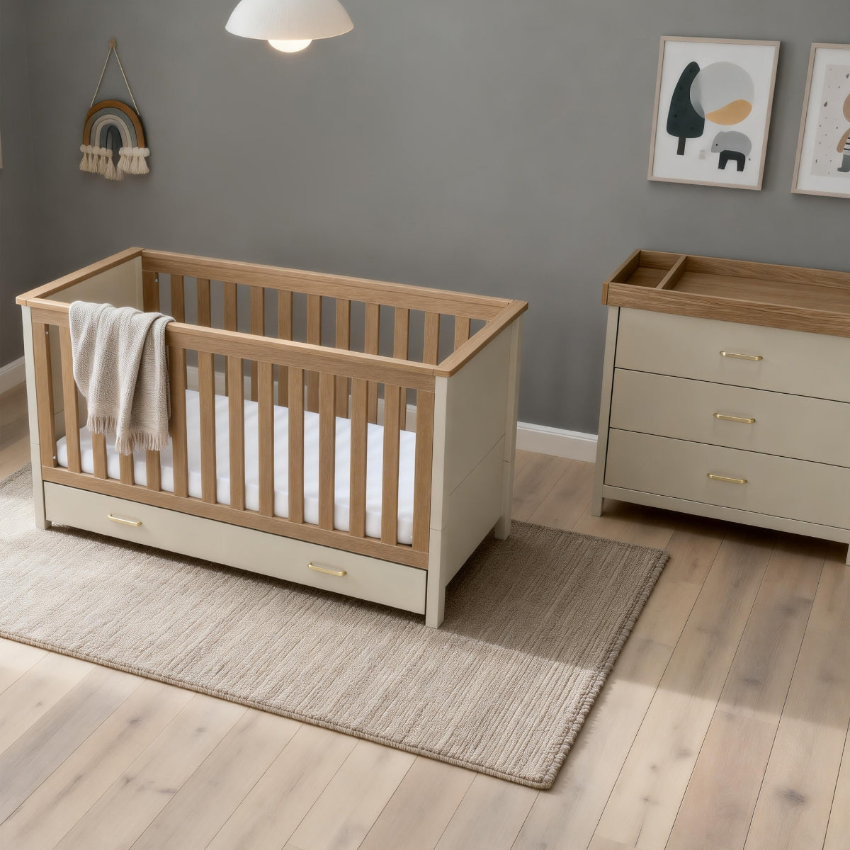 Babymore Mira Cashmere Warm Oak 2 Piece Nursery Set featuring convertible cot bed and three-drawer nursery chest changer