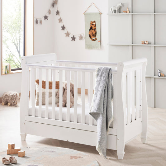 Babymore Eva Sleigh Drop Side Cot Bed 120 x 60cm White with drawer