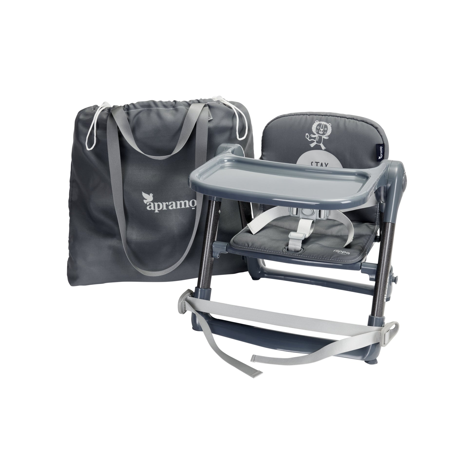 Image showing a grey apramo flippa rockstar kids travel dining booster seat with a detachable tray, an adjustable 3 point safety harness, with a grey added cushion on the seat next to a handy travel carry bag