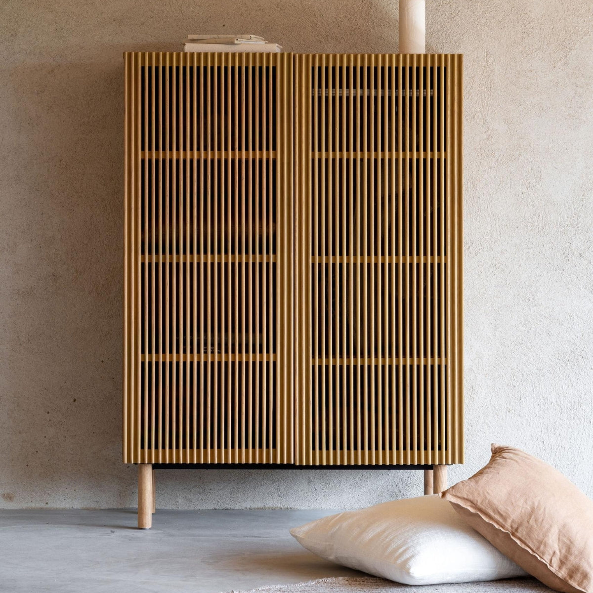 Quax Hai No Ki Natural Ash wardrobe styled in a Japanese inspired contemporary nursery with neutral decor 