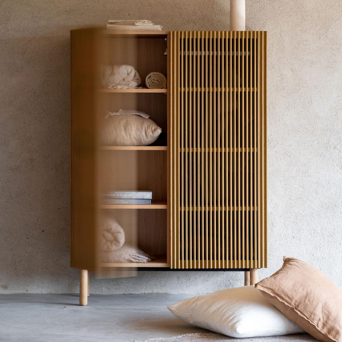 Quax Hai No Ki Natural Ash wardrobe styled in a japandi inspired nursery with neutral decor 