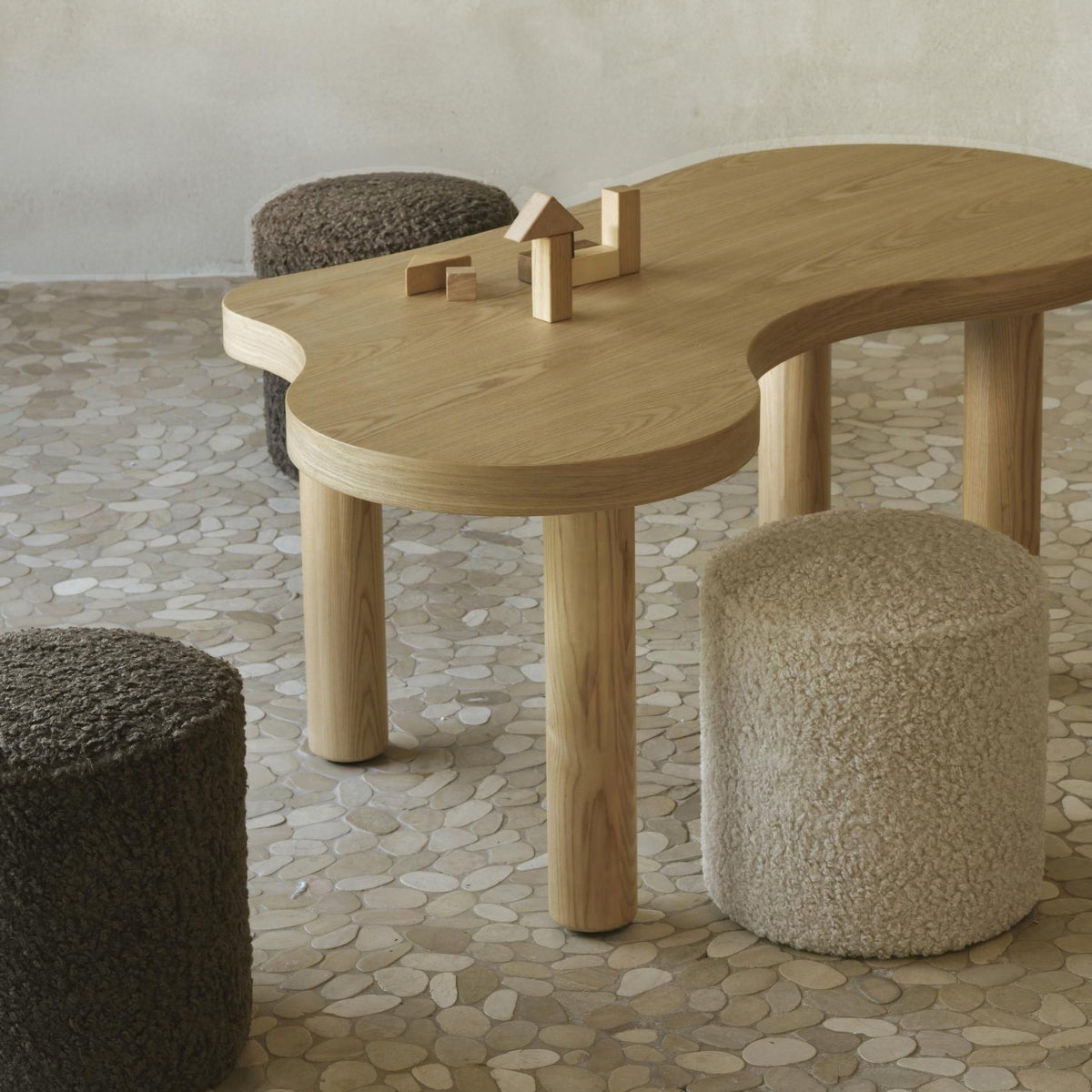 Quax Sheep kids pouf with Modular Organic Kids Table in modern nursery