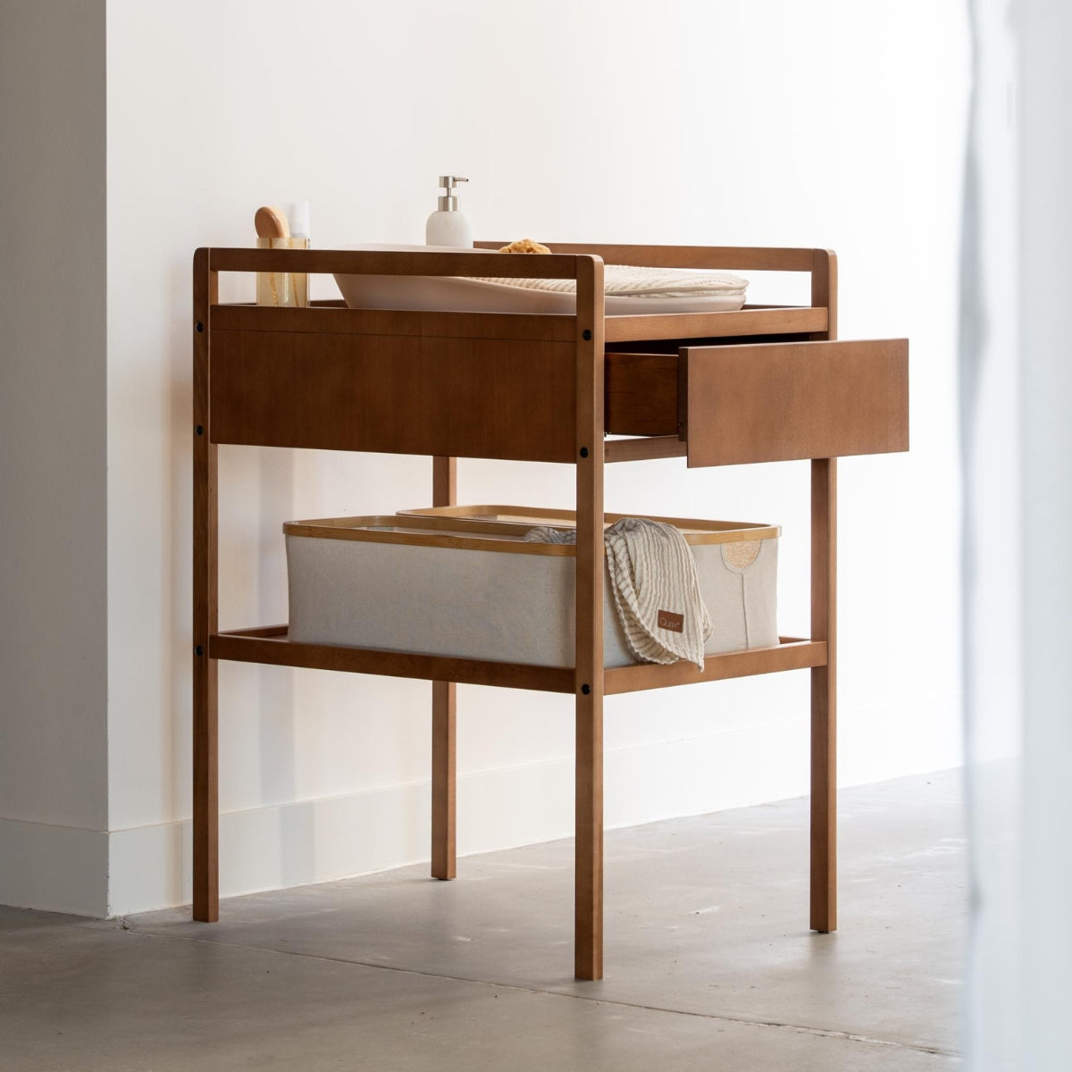quax mori baby changing table walnut with open storage drawer