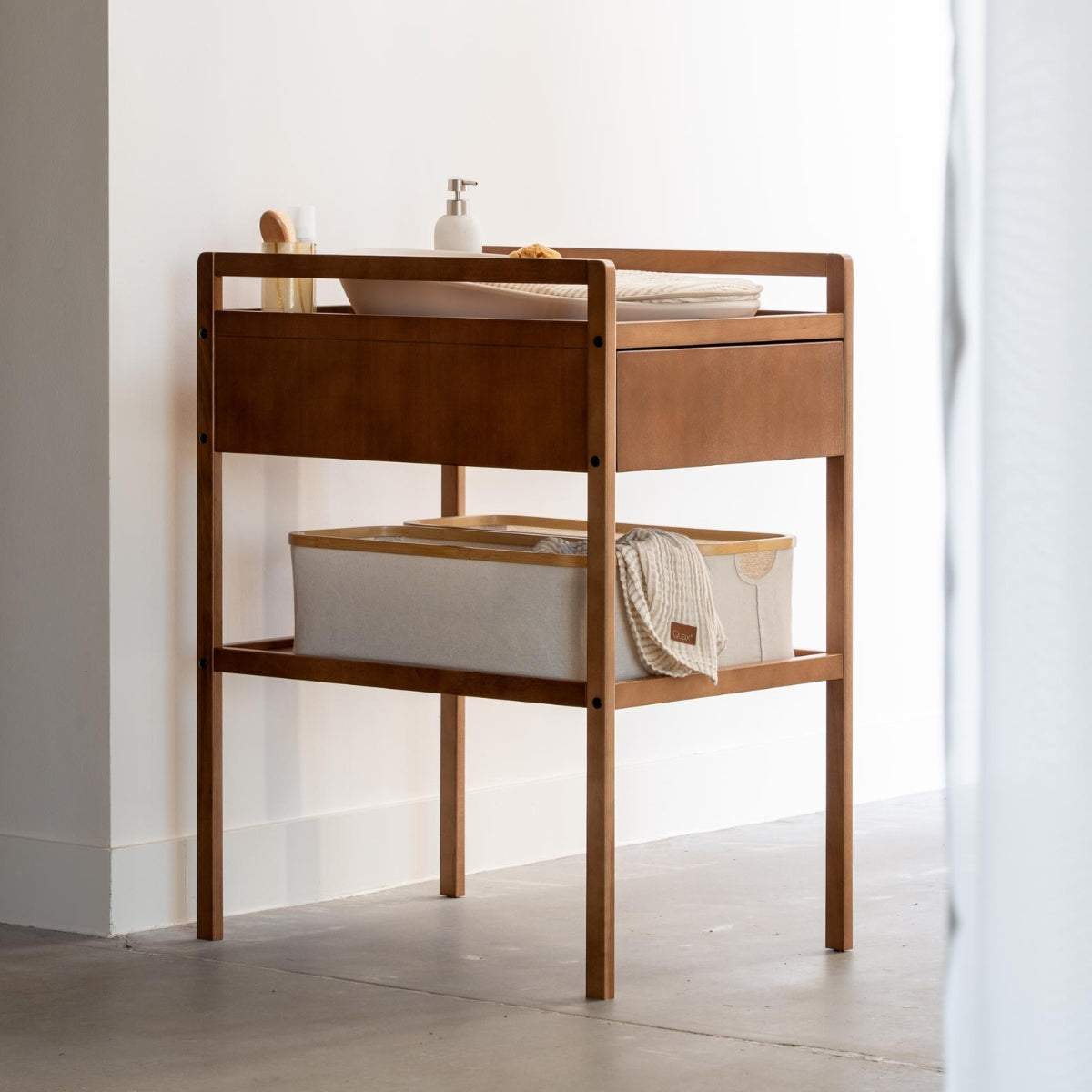 quax mori baby chaging table with drawer in modern home with neutral decor