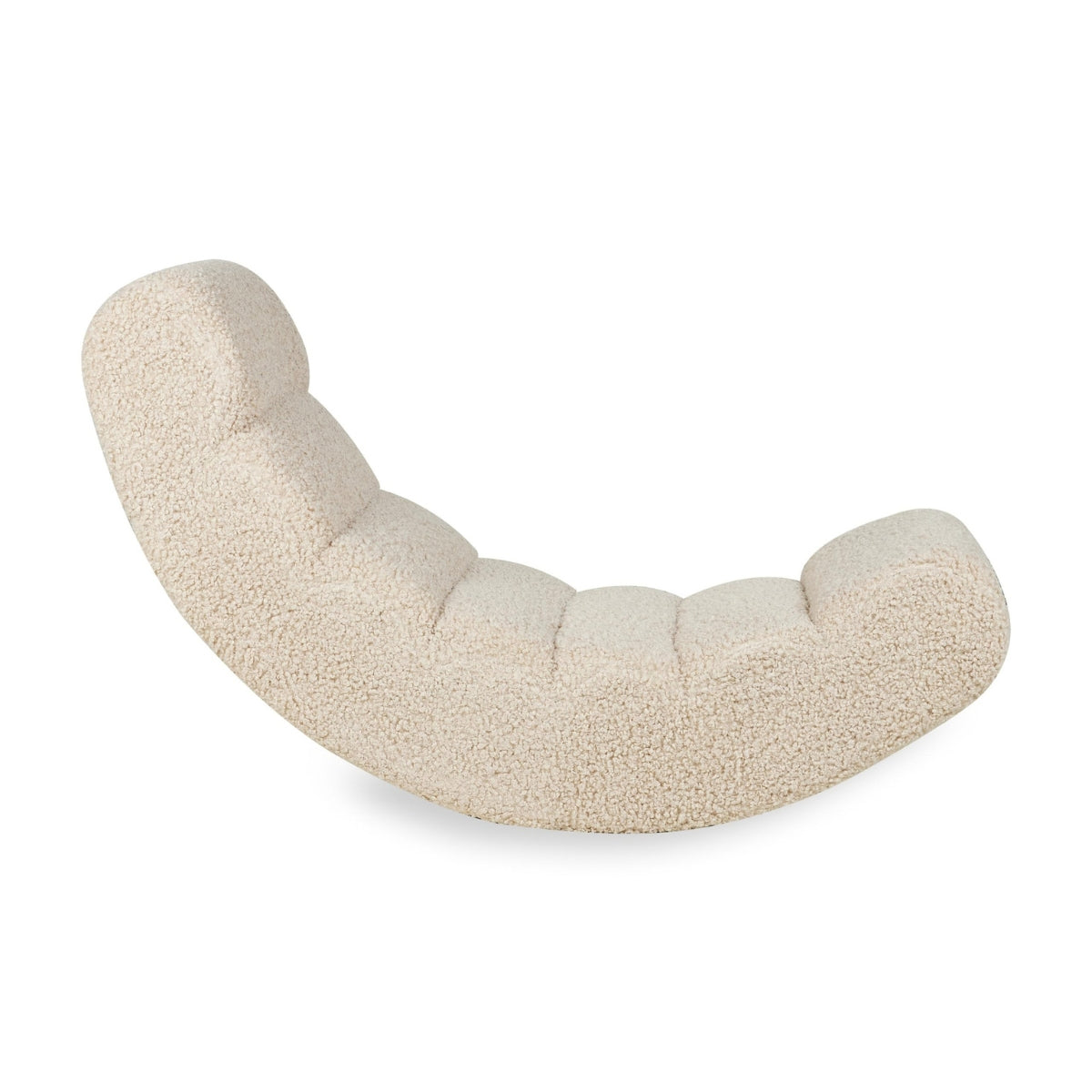 side view of Quax Rocking Banana rocking chair upholstered in soft Sheep teddy fabric