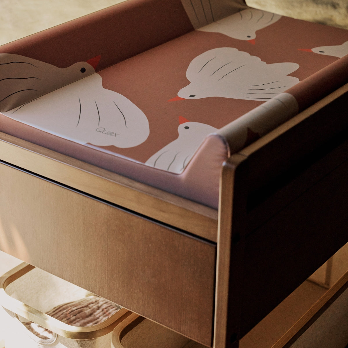 Quax Happy Birds anti roll wedge baby changing mat 70x50cm with raised sides on mori changing table