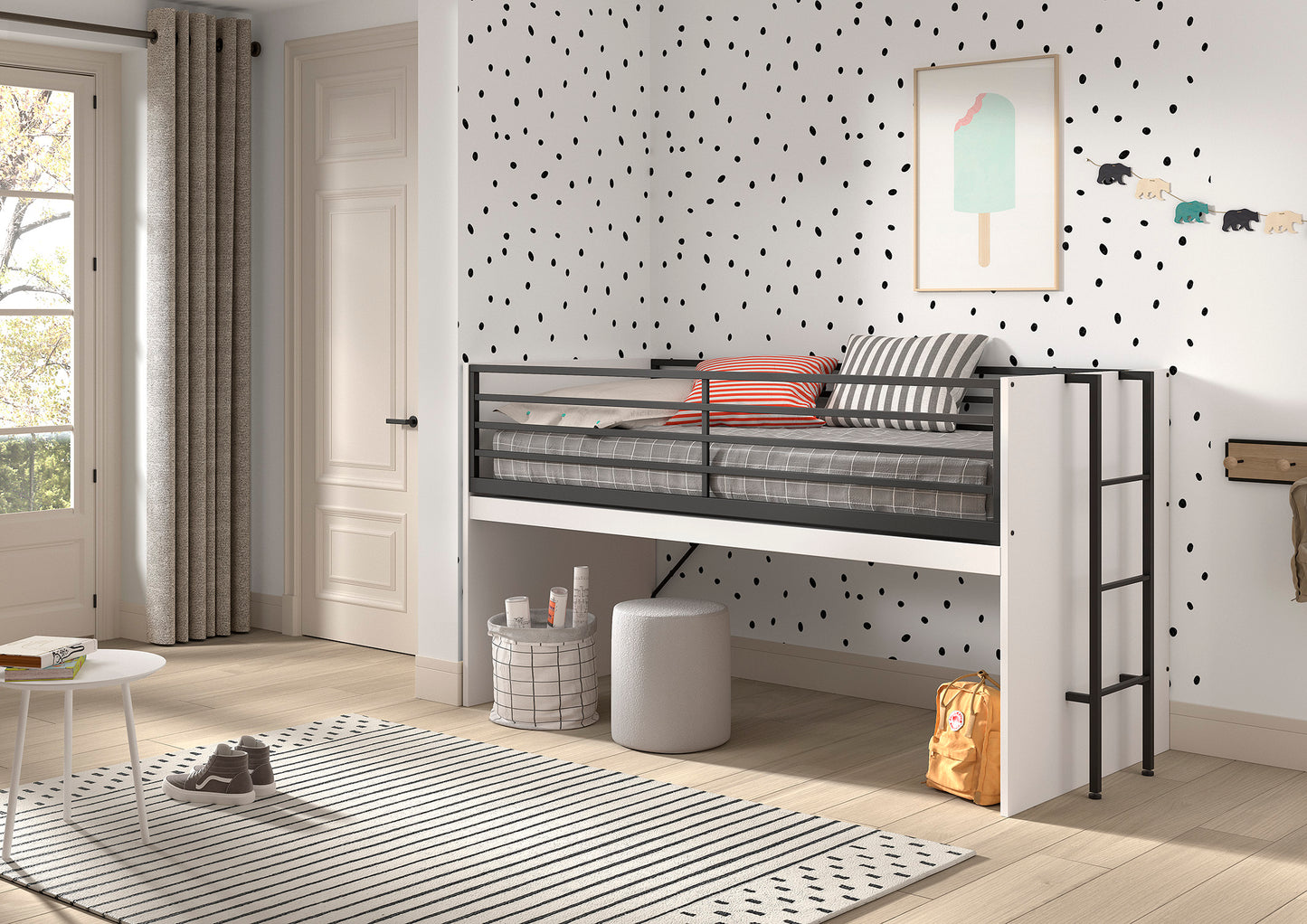 A modern children’s bedroom with a mid sleeper cabin bed that has an extendable wooden desk underneath.  The desk has been folded away for storage. The bed has a white finish with black metal railings and ladder. The desk holds books, colorful dinosaur toys, and a laptop. 