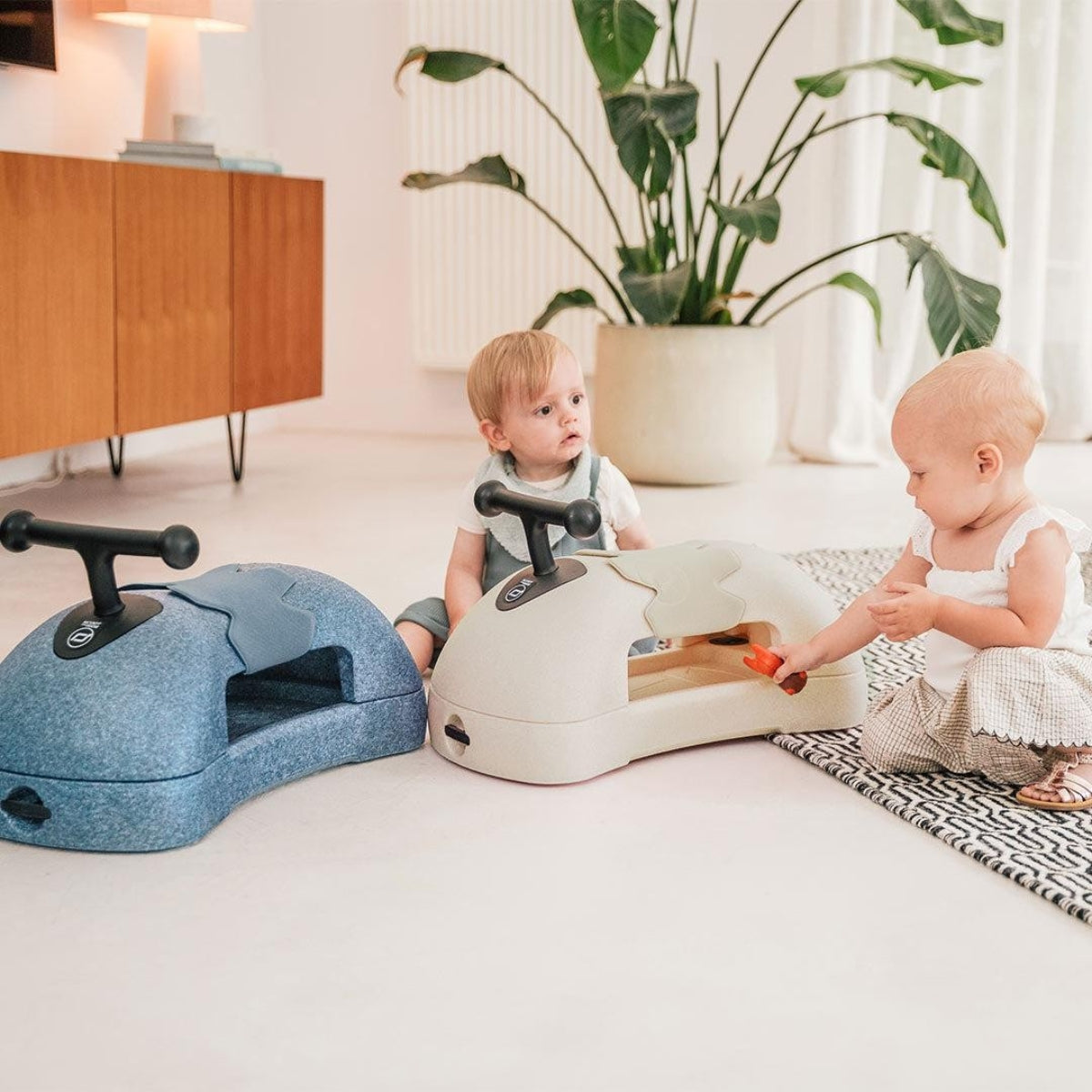 baby and toddler with Scoot and Ride My First 3 in 1 Baby Walker Steel in living room