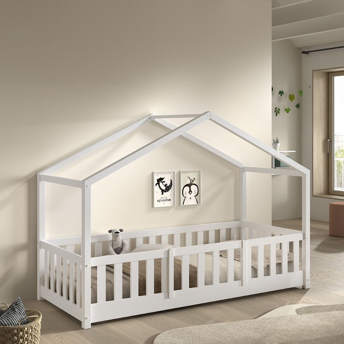 Close-up of sturdy solid pine safety guard rail on a white house-shaped toddler floor bed frame