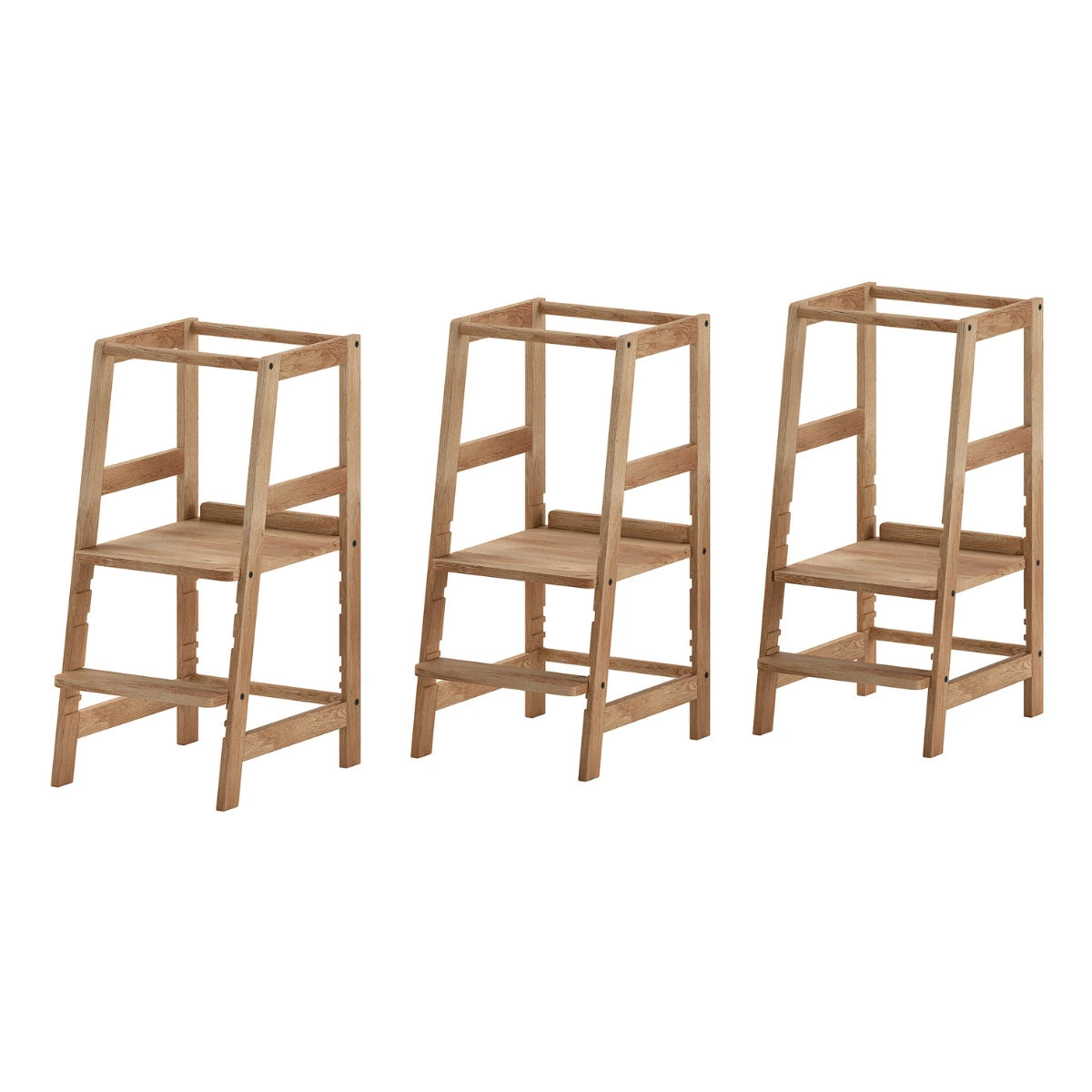three Vipack Jaxx Forrest Toddler Learning Tower in solid oak wood  showing different heights on plain white background