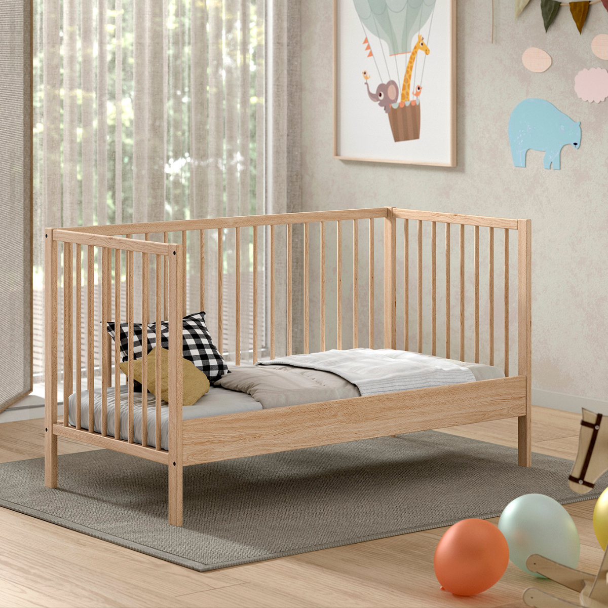 VIPACK JAXX Modern natural coloured wooden 140x70cm cot bed in a modern nursery baby bedroom. FSC certified European beech wooden baby cot. Modern design sturdy looking well built baby cot bed showing day bed mode. One side of cot removed to be left open to use as Montessori day bed for toddler 