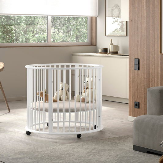 round white baby playpen made from sustainable wood in living area of modern looking home