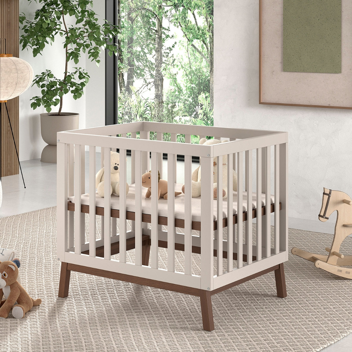Wooden baby playpen in clay and walnut finish in modern family home with neutral decor