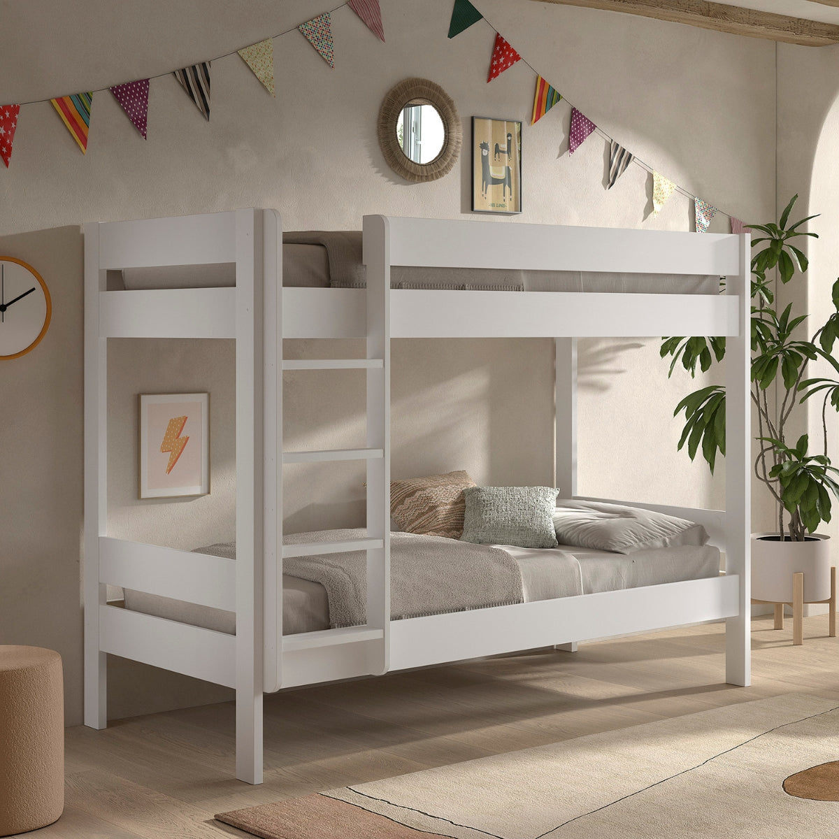 White VIPACK PRIMO wooden bunk bed with an integrated ladder, styled in a child's bedroom with colorful bunting