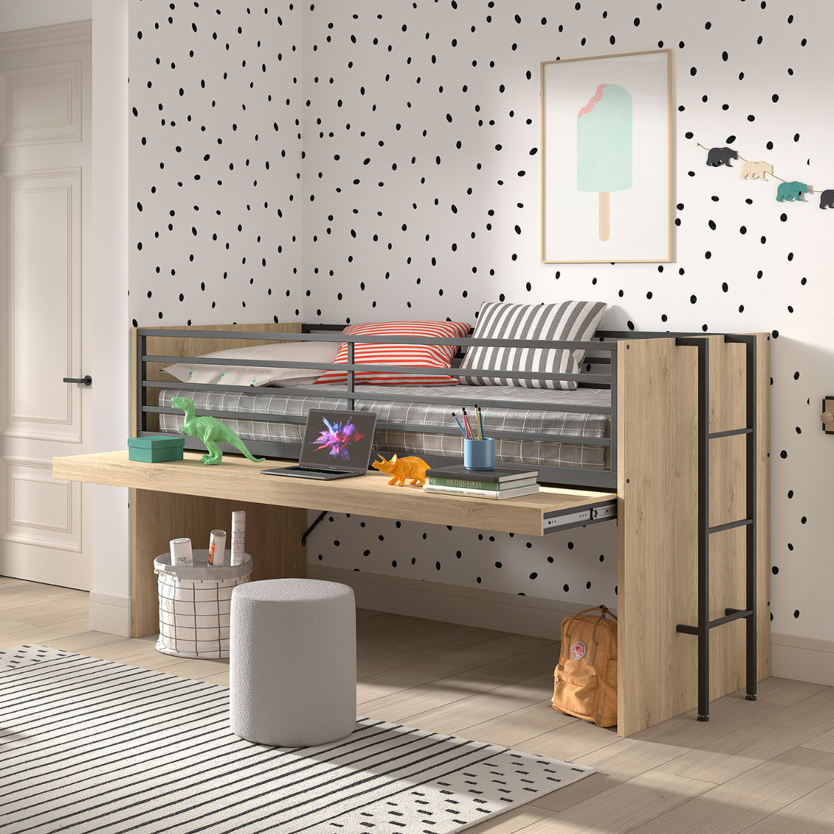 A modern children’s bedroom featuring a VIPACK SAM mid sleeper cabin bed that has an extendable wooden desk underneath. The bed has a natural wood finish with black metal railings and ladder. The desk holds books, colorful dinosaur toys, and a laptop. 