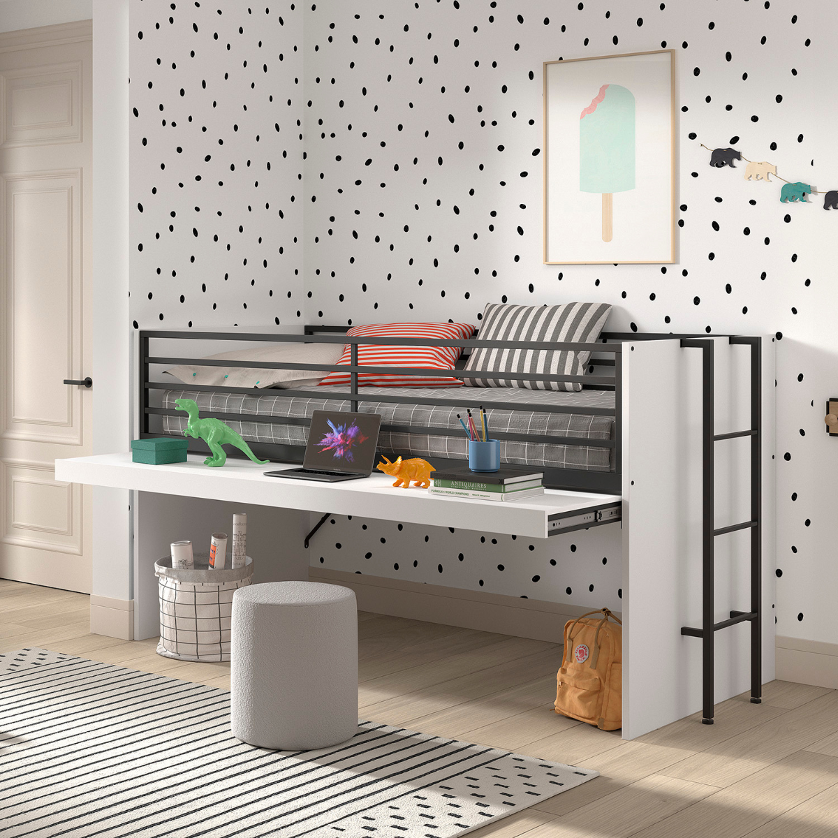 A modern children’s bedroom featuring a VIPACK SAM mid sleeper cabin bed that has an extendable wooden desk underneath. The bed has white finish with black metal railings and ladder. The desk holds books, colorful dinosaur toys, and a laptop. 