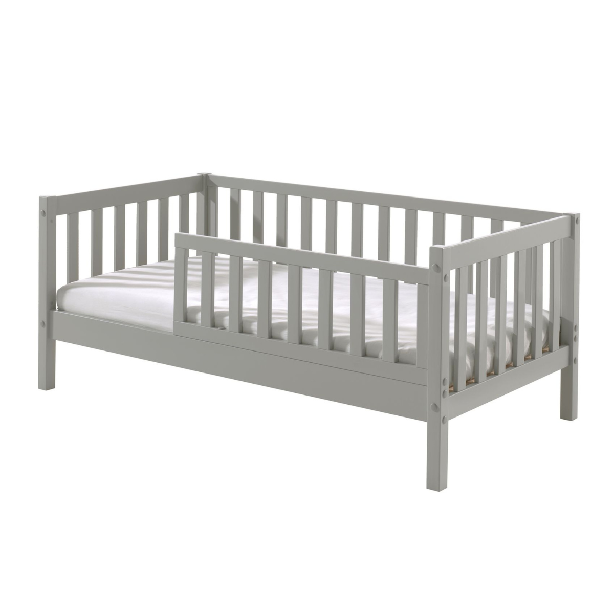 sturdy looking well built grey VIPACK JAXX peuterbed toddler bed made from FSC certified wood with guard rail and mattress on plain white background