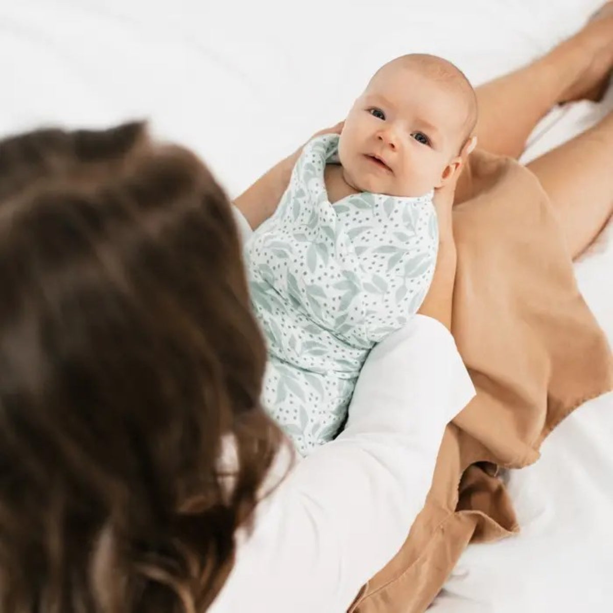 baby wrapped in leaf colour aden + anais Essentials Cotton Muslin Swaddle Blanket Damsel.