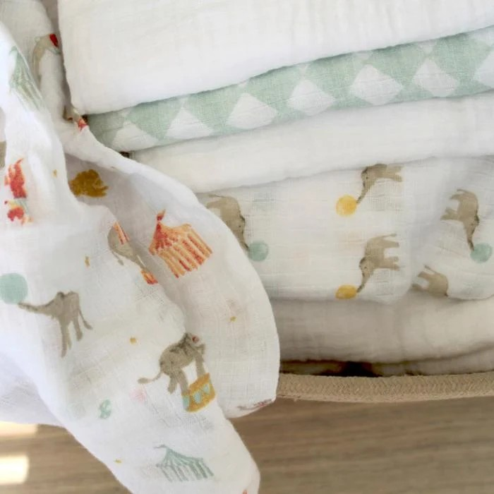 close up of aden + anais 100% cotton muslin squares for baby in the Elephant Circus print for feeding, burping, winding and everyday baby care.