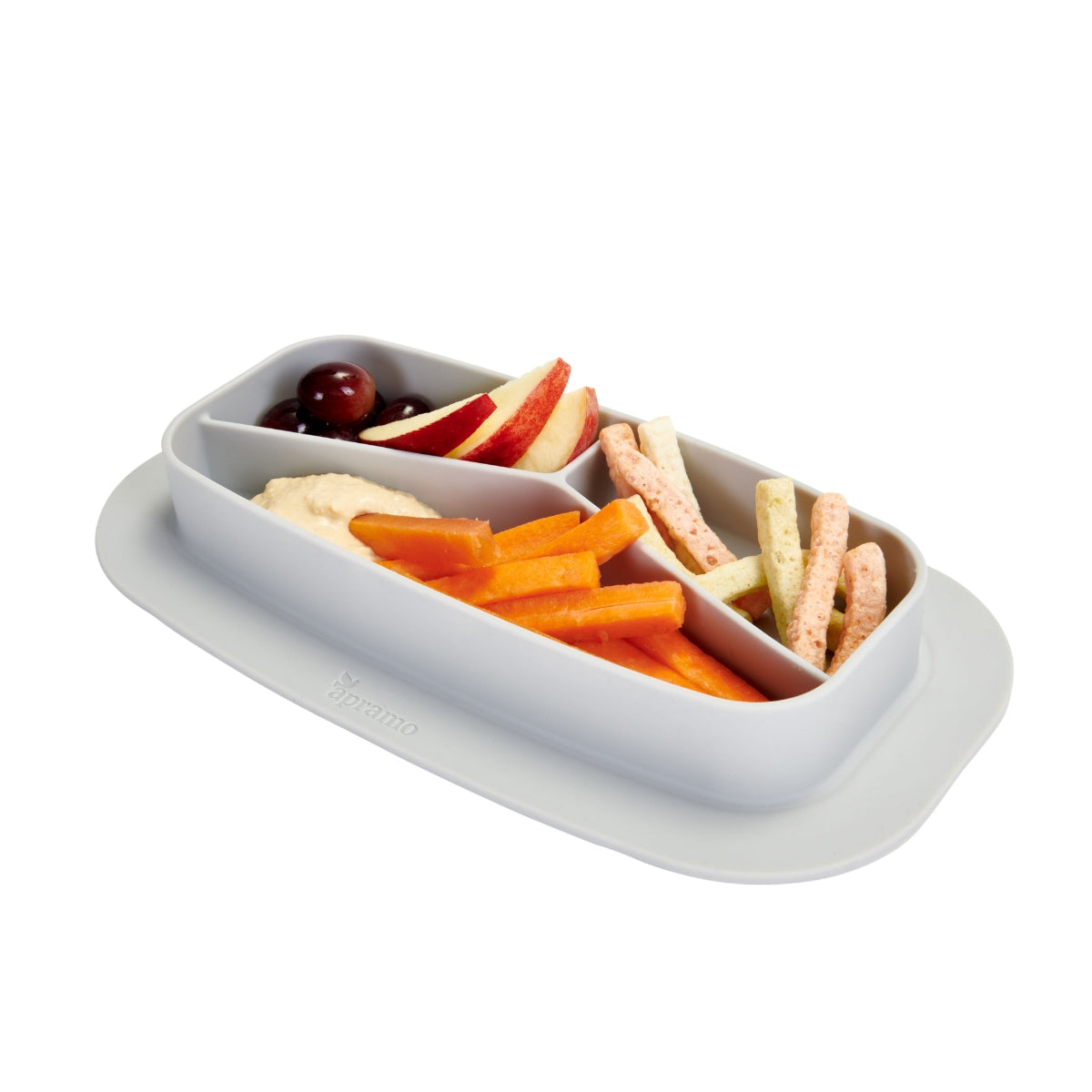 Divided silicone toddler weaning plate with fruits, vegetables, and crackers on a white background