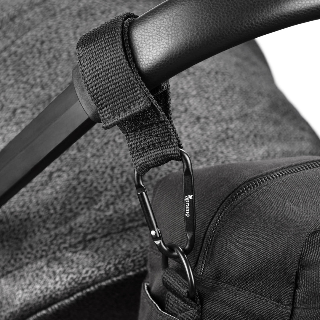 apramo stroller organiser attached to pram handle with Velcro stroller hook