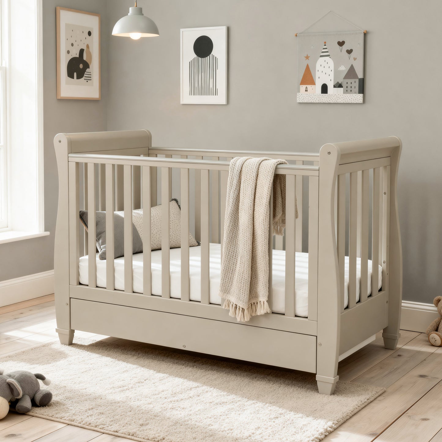 babymore Eva dropside sleigh cot bed cashmere with mattress and underbed storage drawer in modern nursery 