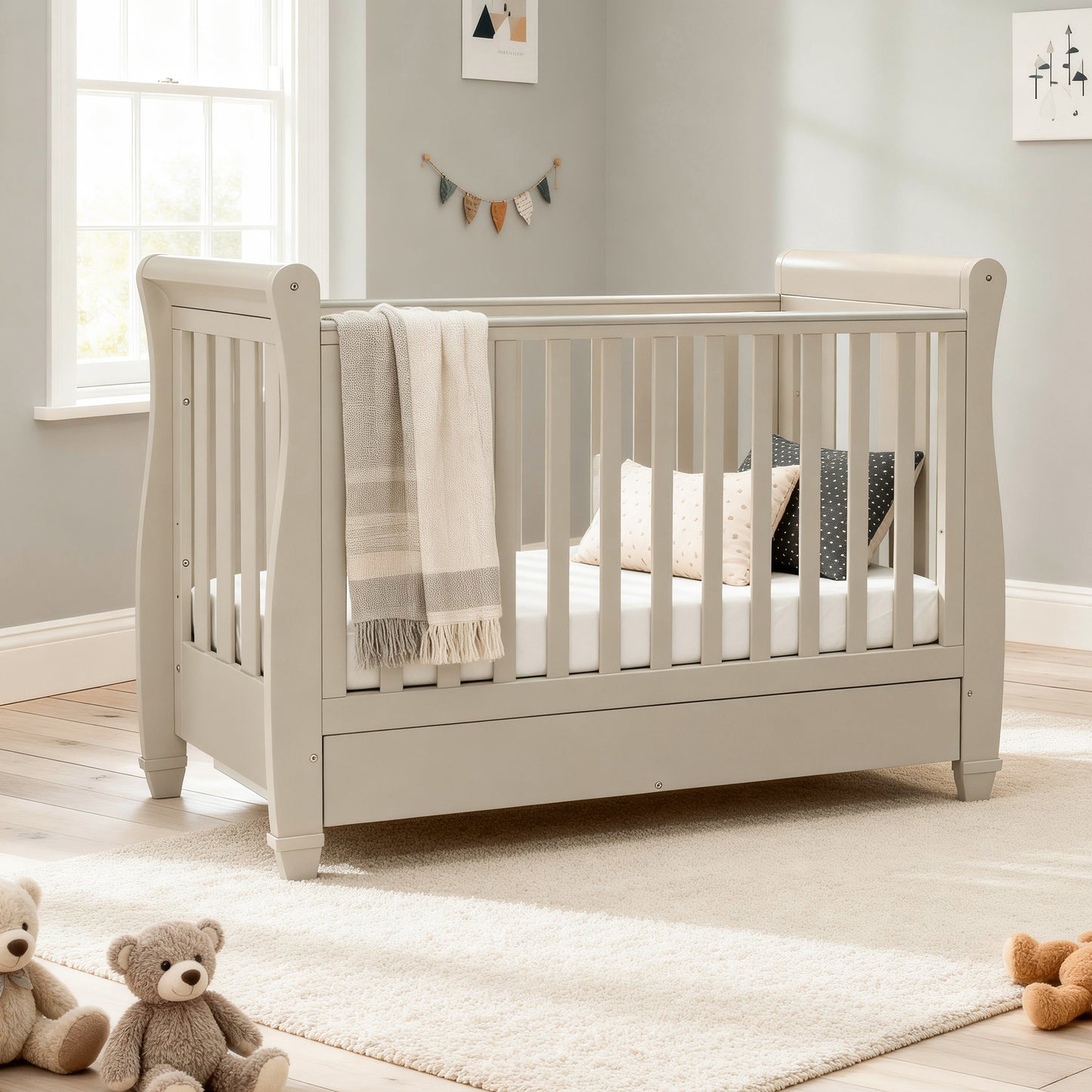 babymore Eva dropside sleigh cot bed cashmere with underbed drawer in baby nursery 