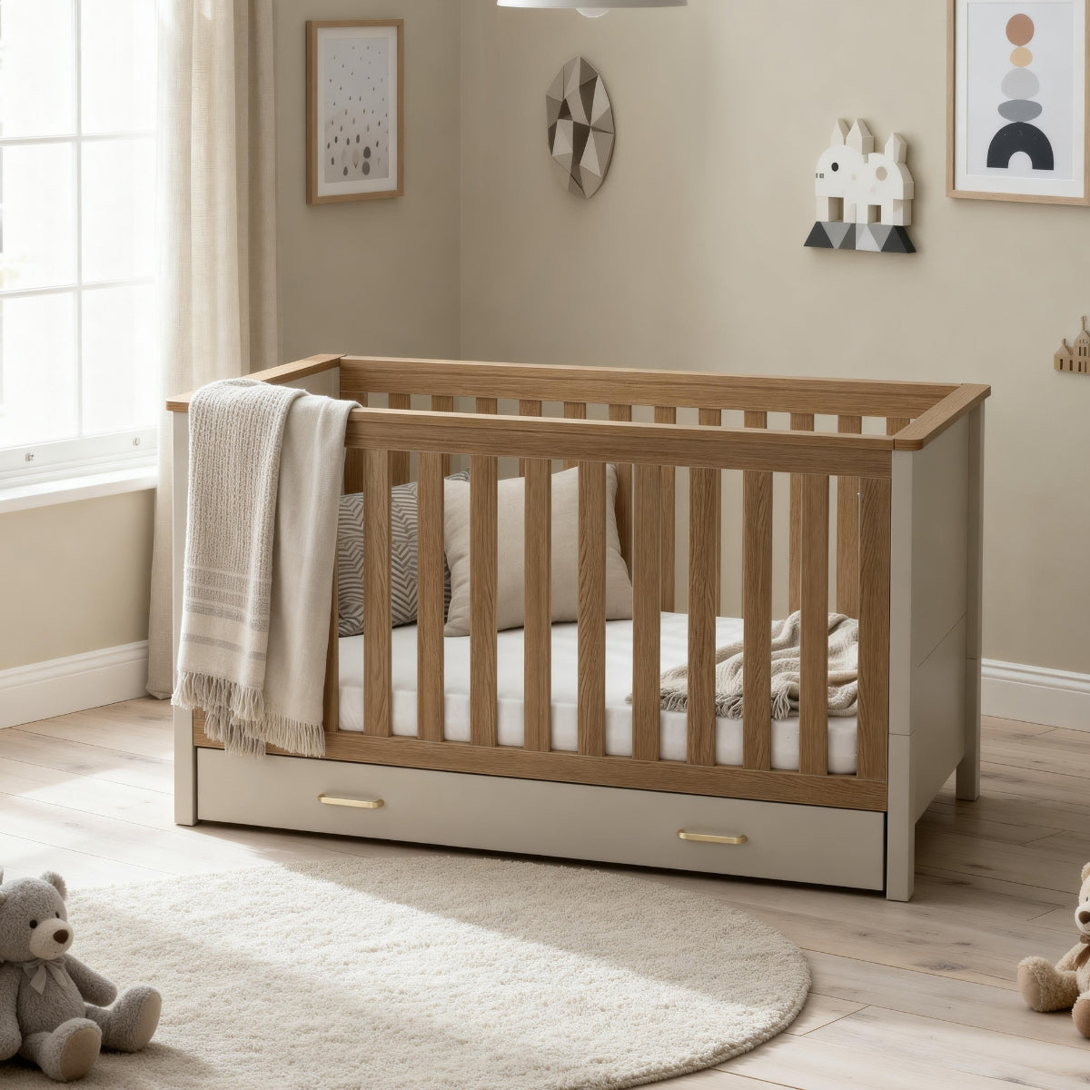Babymore Mira Cot Bed 140 x 70cm in Cashmere & Warm Oak with underbed storage drawer in nursery