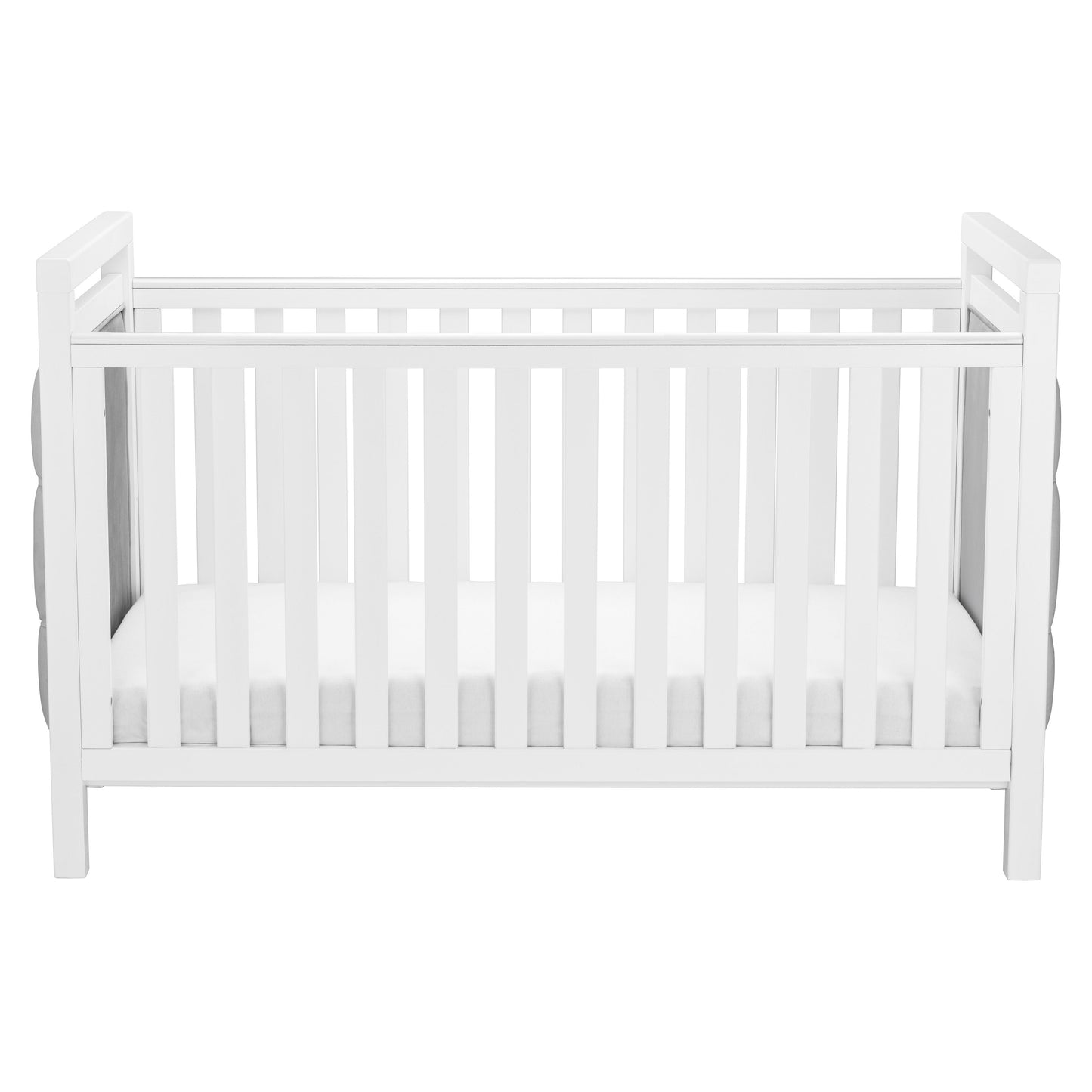 Side profile of white Babymore Velvet Deluxe convertible cot bed on plain white background