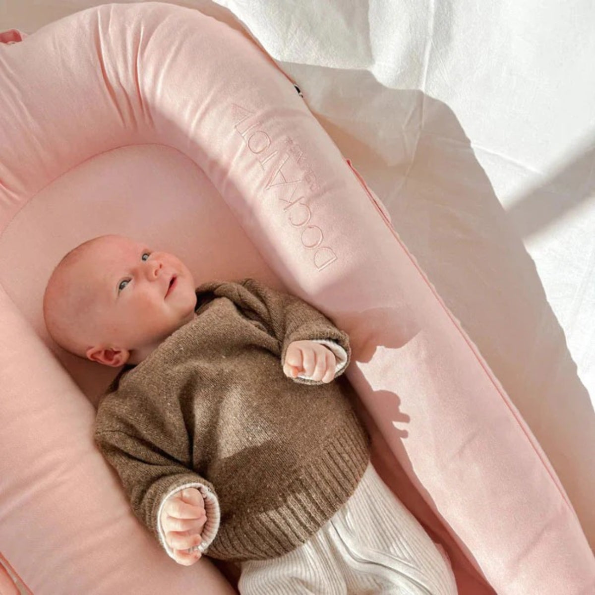 DockATot Deluxe+ Baby Dock –  Pink Blossom Chambray