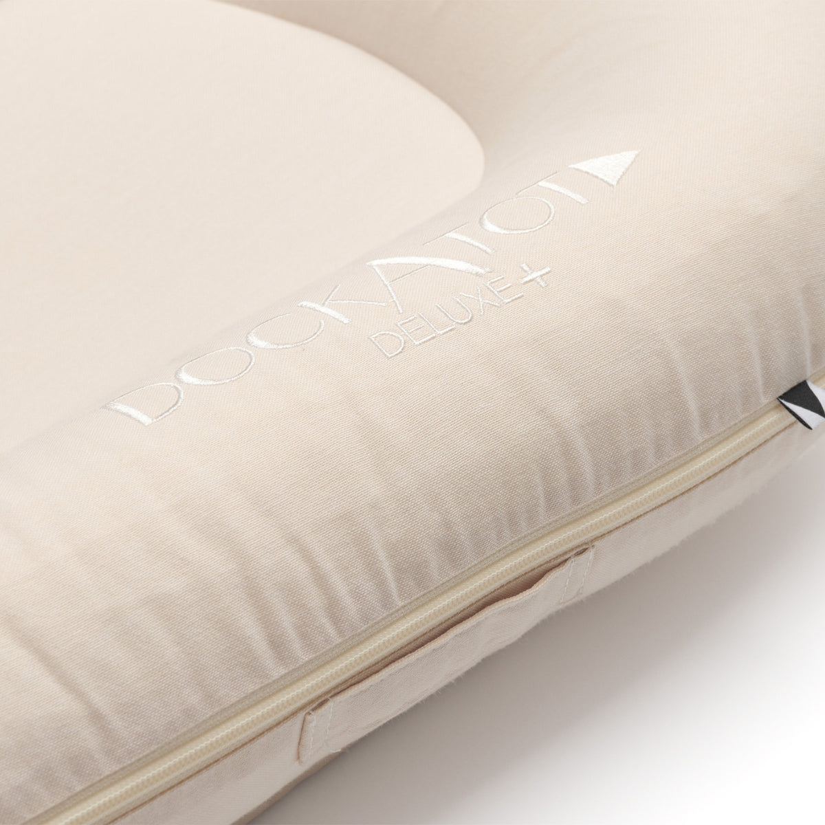 DockATot Deluxe+ Baby Dock – Sand Chambray