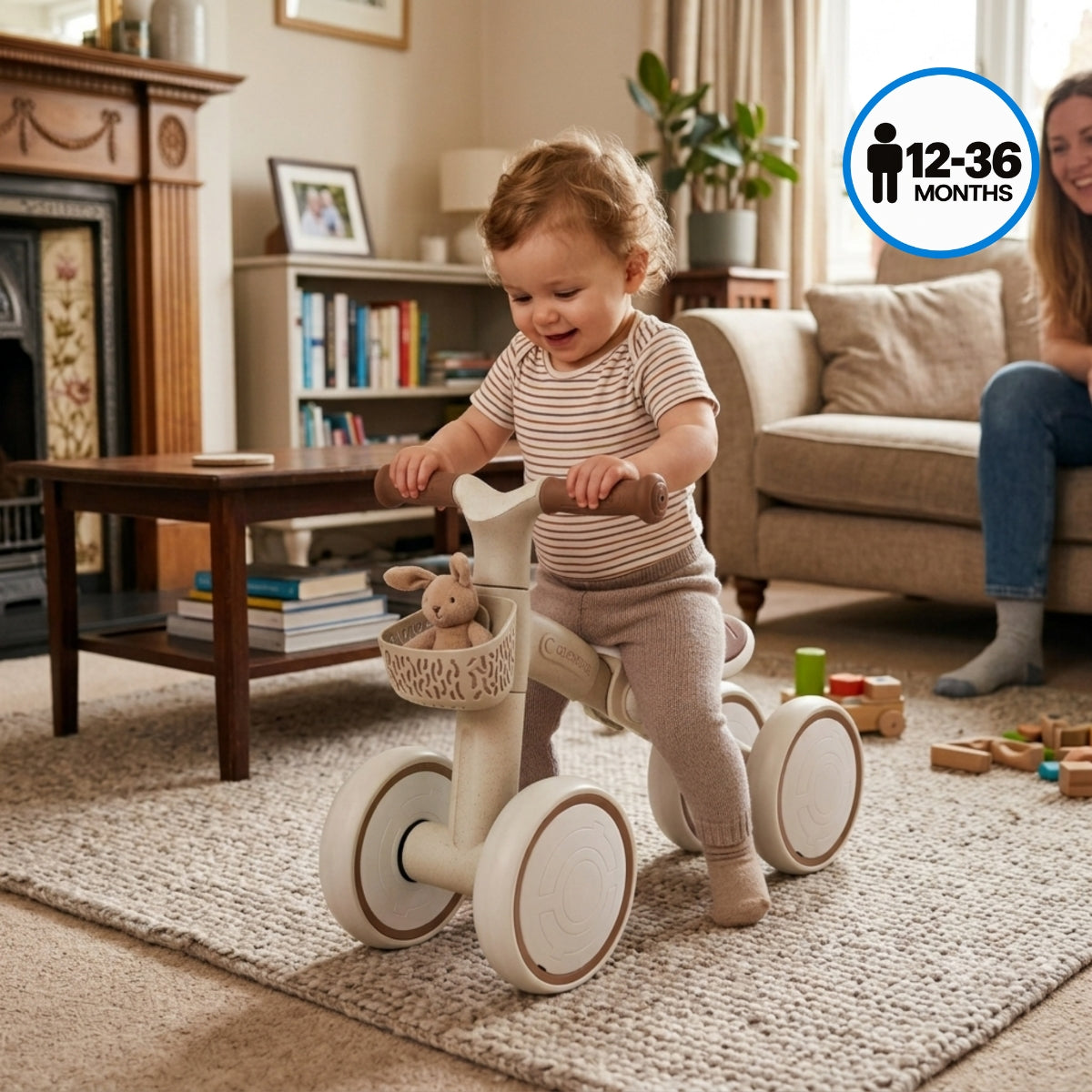 toddler riding a Globber Learning Bike Eco Coconut while mother watches