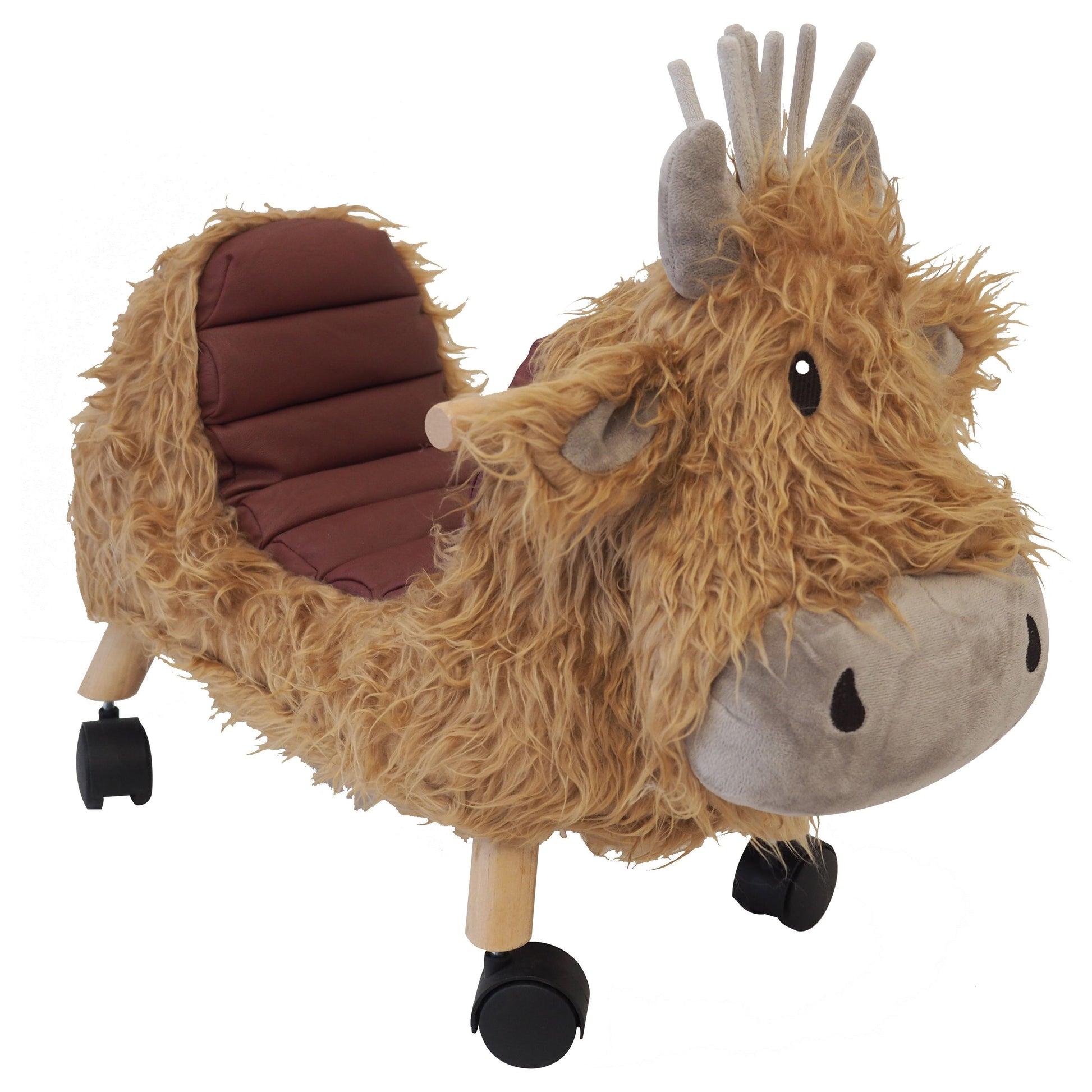 A plush, ride-on Highland Cow toy with a padded leatherette seat, featuring a wooden sturdy frame and black swivel wheels, designed for toddlers.