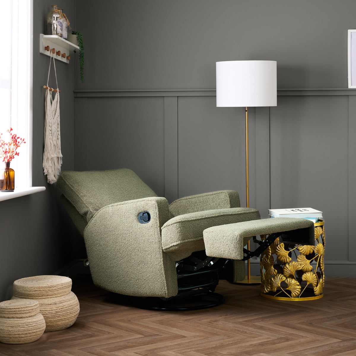Obaby Madison nursing chair in olive green fabric in reclined position with legrest in modern baby nursery