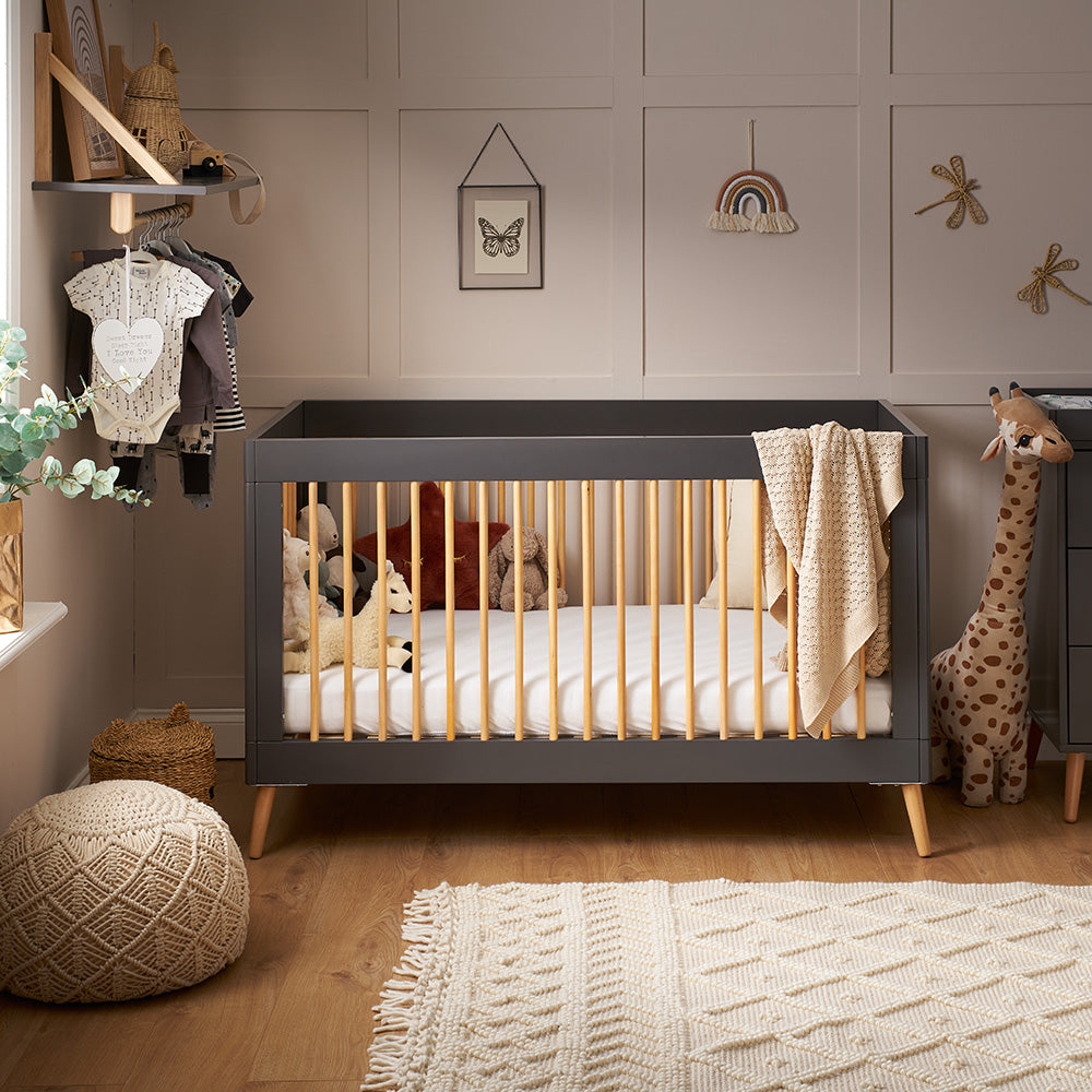 Obaby Maya Cot Bed in Slate and Natural with Scandinavian-inspired styling for a 140 × 70cm mattress in baby nursery