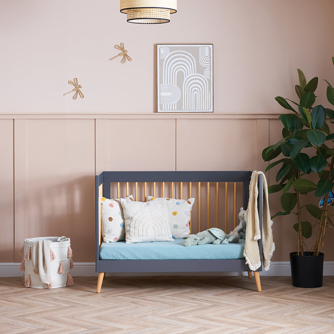Obaby Maya Mini Cot Bed in Slate and Natural with open side as toddler bed in nursery