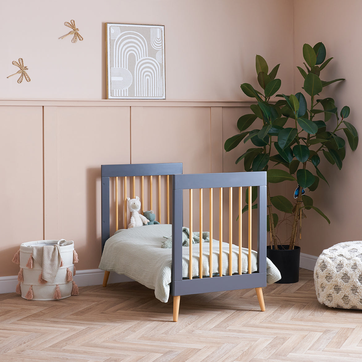 Obaby Maya Mini Cot Bed in Slate and Natural with both sides removed converted in to mini bed for toddler in modern nursery bedroom