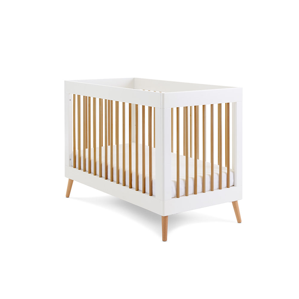Obaby Maya Mini Cot Bed in White and Natural with Scandinavian-inspired styling for a 120 × 60cm mattress on plain white background