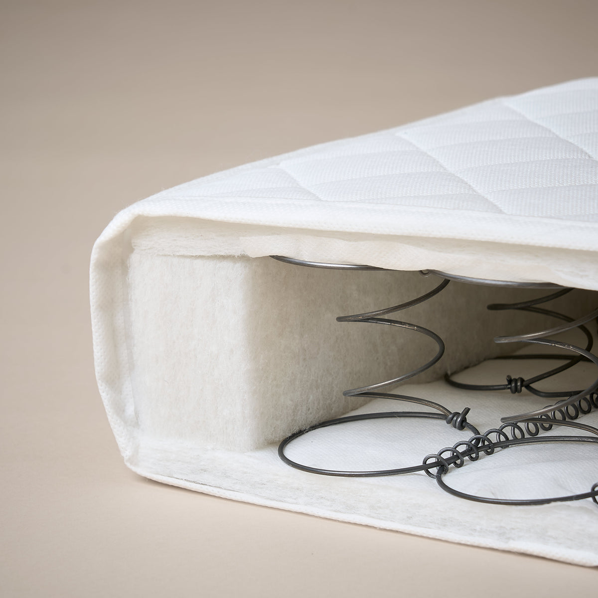 Obaby space saver cot sprung mattress measuring 100 × 50 × 10cm with quilted removable cover