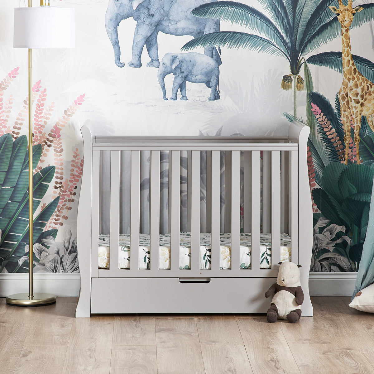 Obaby Stamford warm grey space saver sleigh cot with storage drawer in small baby nursery room