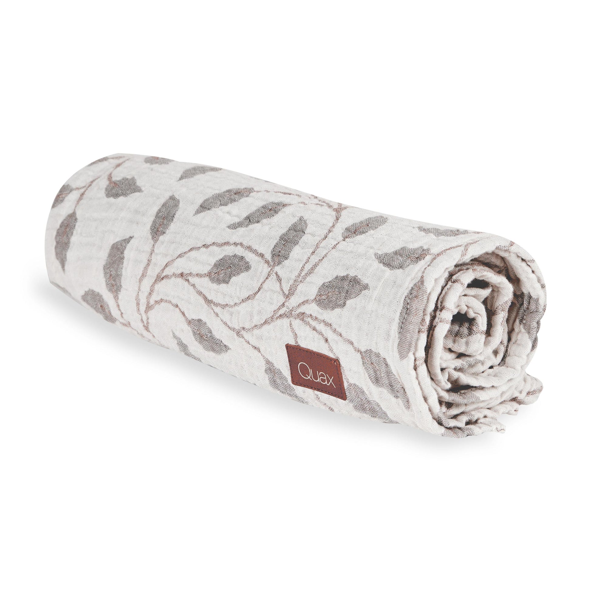 Folded Quax XL muslin blanket in Leaf made from 100% premium cotton on white background