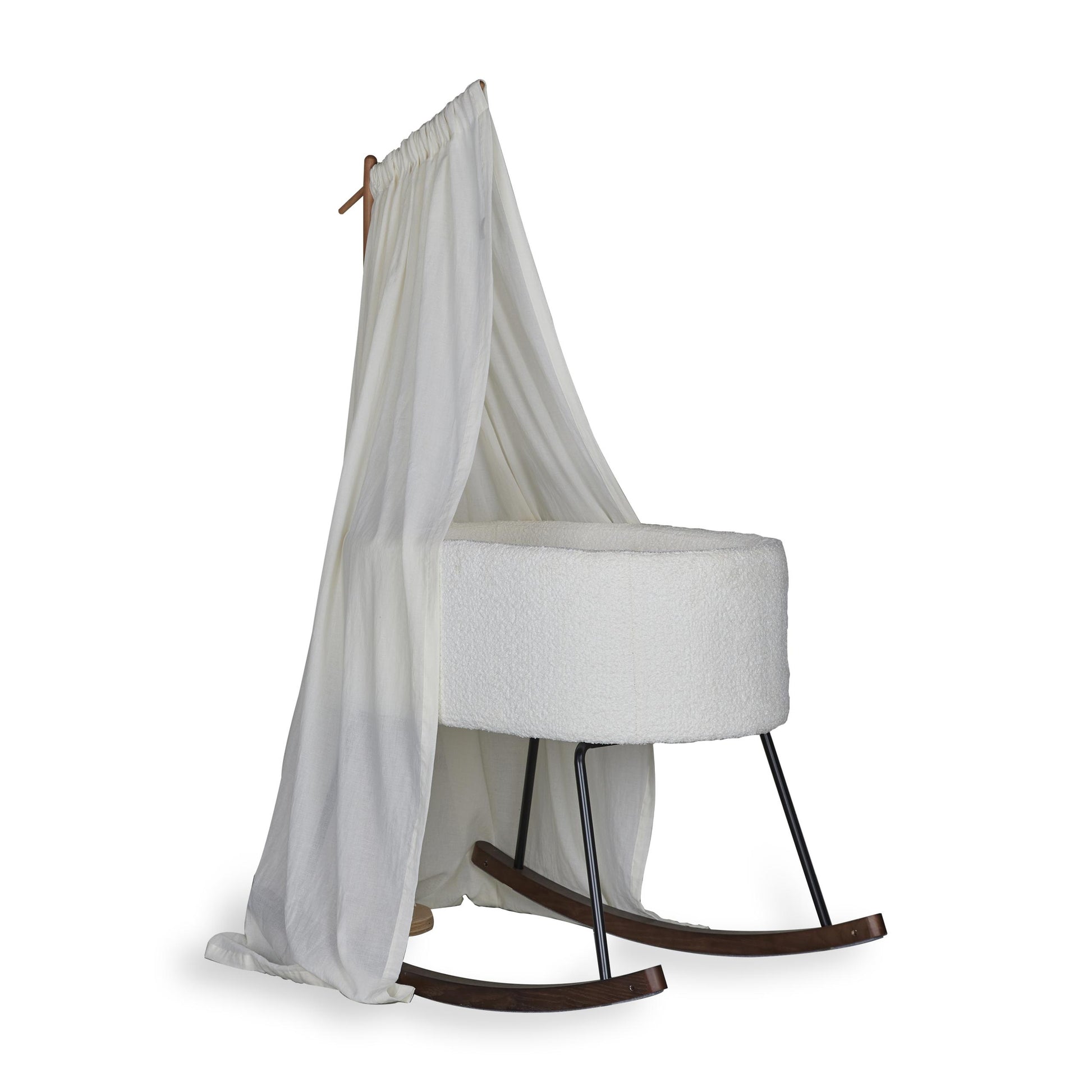 quax rocking cradle deluxe with veil hanging from wooden stand creating cosy surround for baby on plain white background