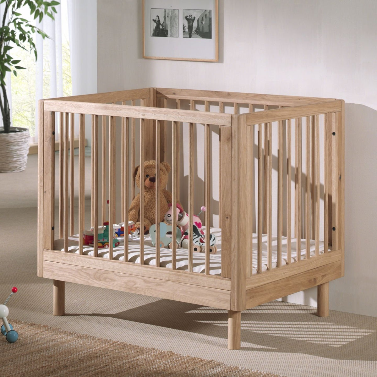 VIPACK JAXX solid oak playpen for baby in modern scandi european nursery room with neutral decor