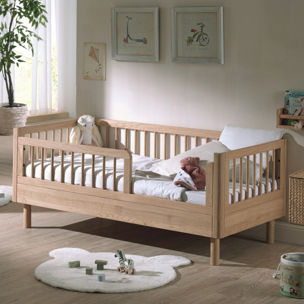 VIPACK FORREST solid oak 140x70cm toddler bed with bed guard in bedroom with neutral decor